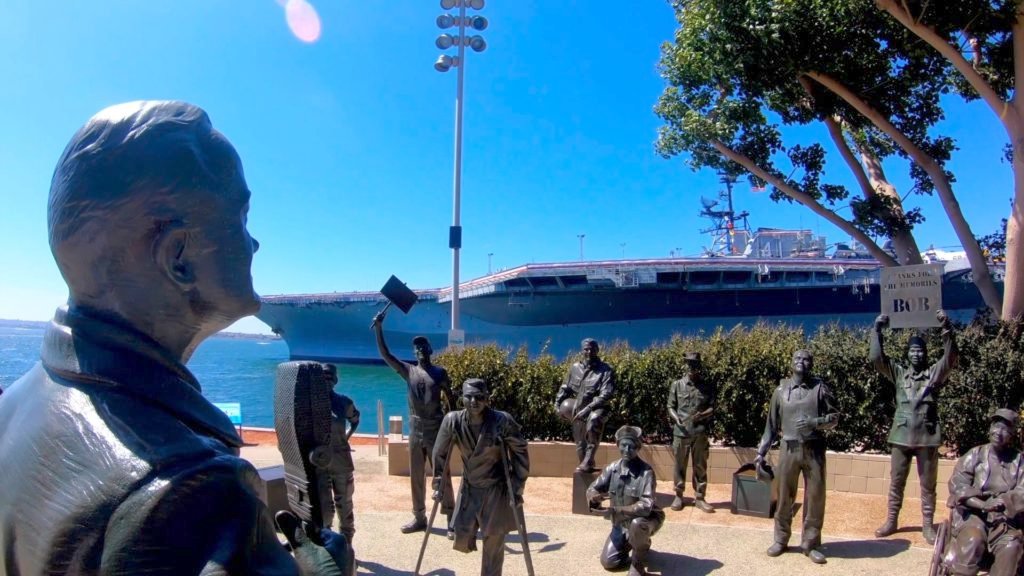 A sculture scene of Bob Hope performing for the troops
