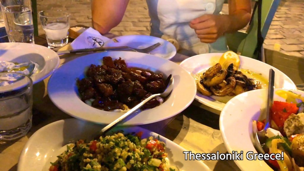 Tigania (pan-fried pork), sauteed mushrooms, Greek salad, and tabouleh (parsley with bulgur, tomatoes, onions, and olive oil)