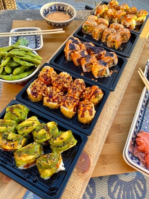 Enjoy sushi dinner plate and edamame appetizer