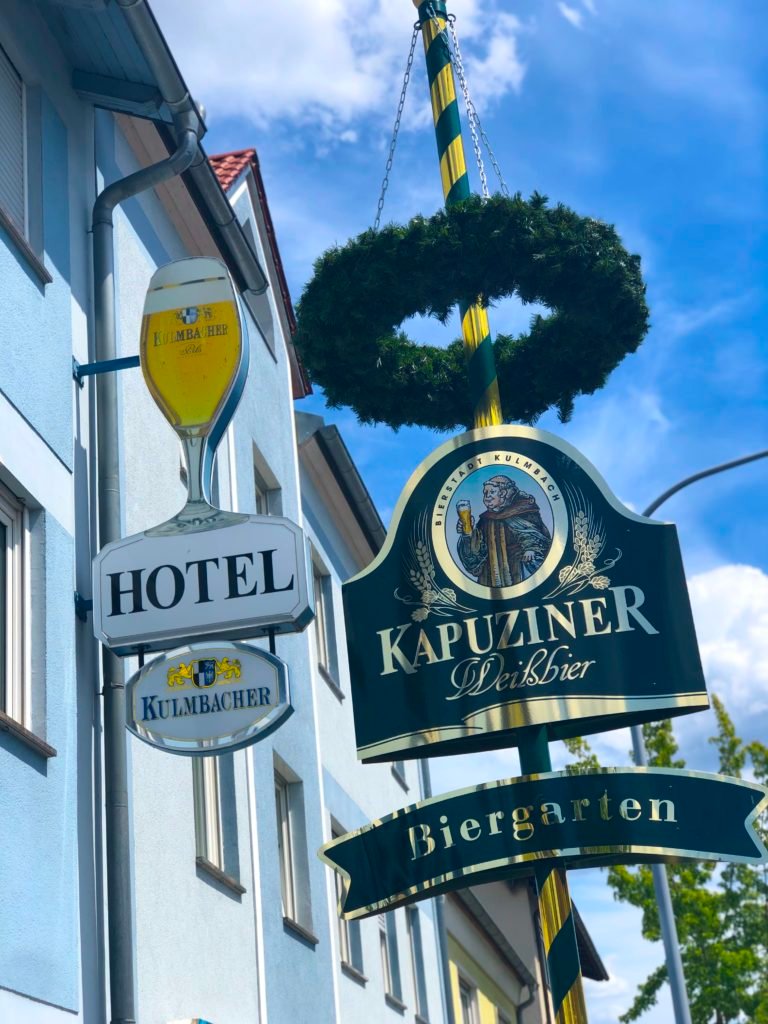 Biergarten sign in front of the Gasthof Hössl