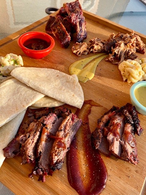 Brisket, ribs, gravy, mac and cheese, get it all from Louis Austin BBQ smokehouse food truck