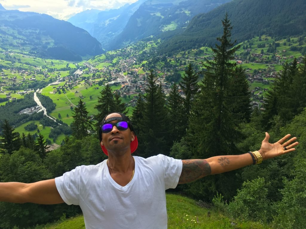 Pfingstegg view of mountains, trees, and the city of Grindelwald