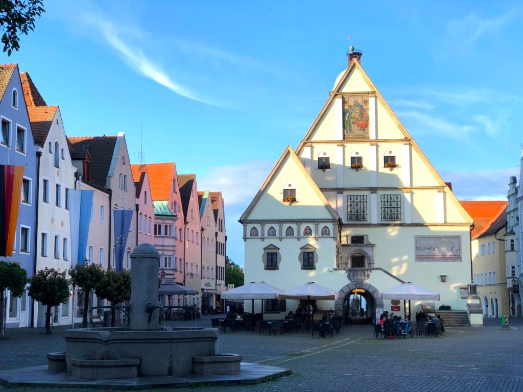 Old city hall, fountains, and colorful buildings in downtown Weiden Germany