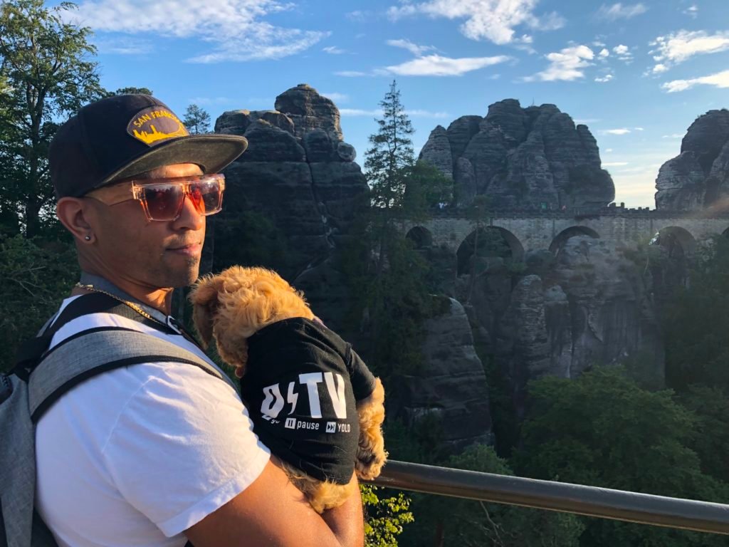 overlook of bastei bridge with dog