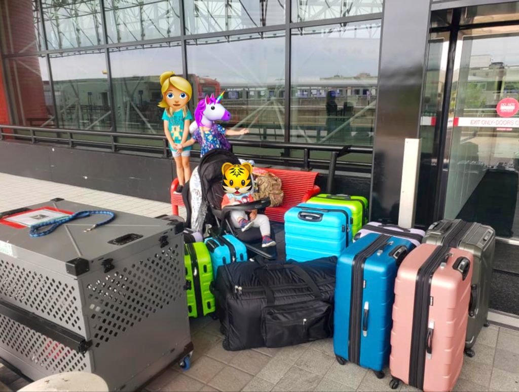 luggage, pet, and kids at BWI airport for patriot express flight